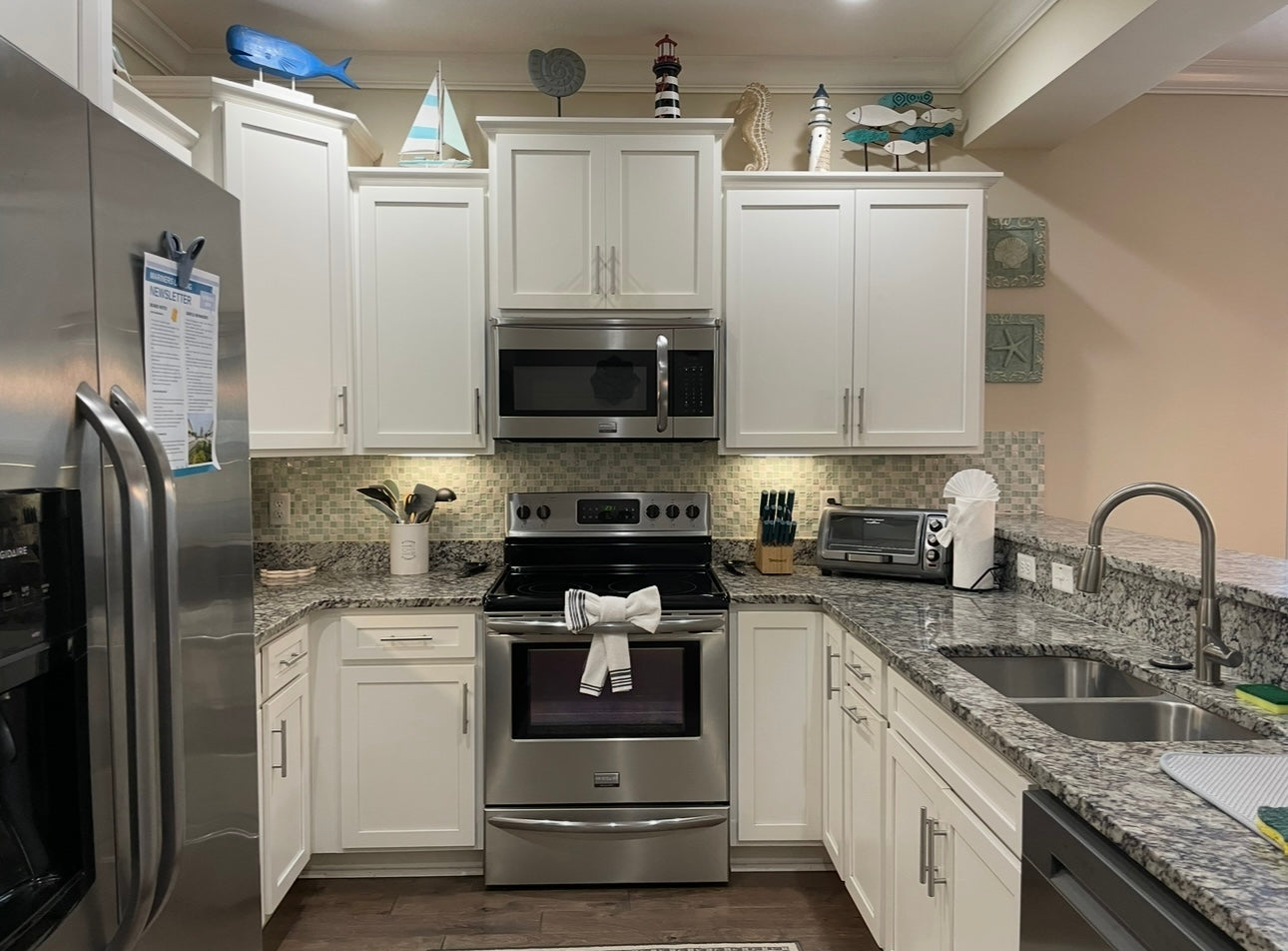 1301 Mariners - Large 4/3.5 End Unit with 2 Car Garage and Lake View*St. Simons, GA